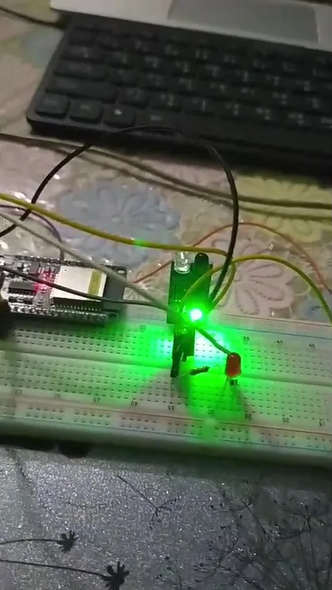 ESP-32 with IR obstacle sensor and green LED lit