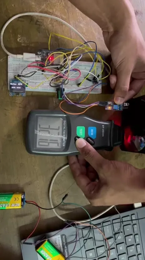 Comparing the ESP-32 RPM reading with a handheld tachometer
