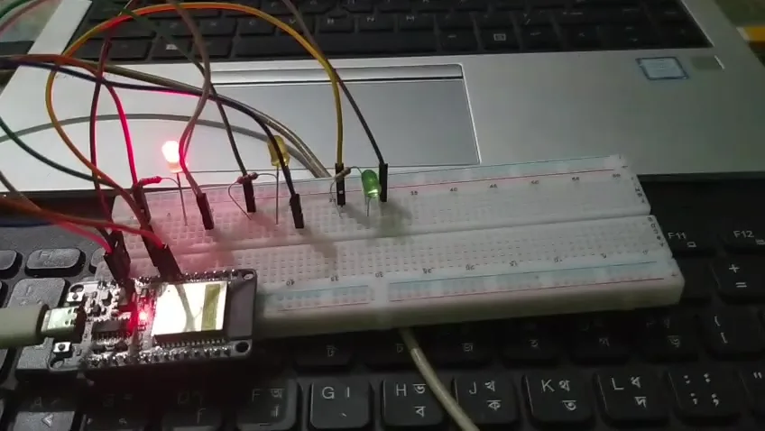 Traffic light model with red LED on
